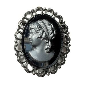 Vintage Black Satin Glass Silver tone Oval‎ Frame Cameo Pin Facing Left